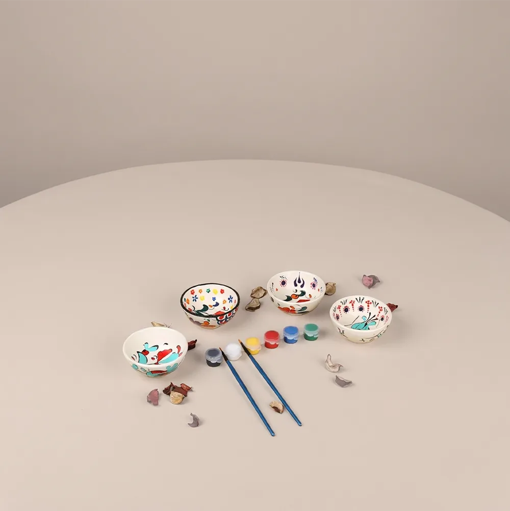 Ceramic painting set with bowls, paints and brushes