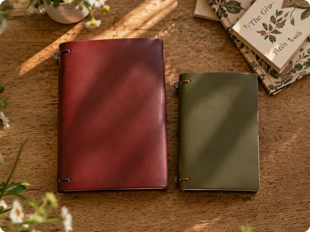 Two sizes of leather journal covers